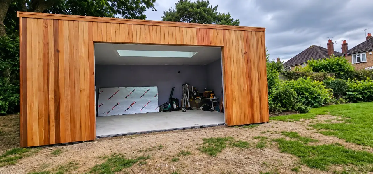 Red cedar exterior while the doors were being fitted