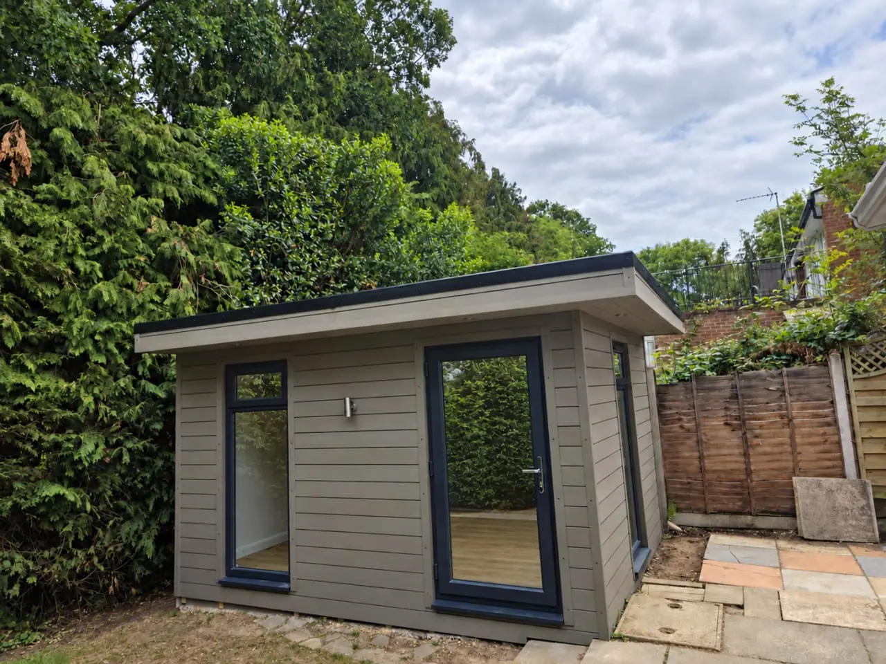 Grey Garden Room beneath Trees