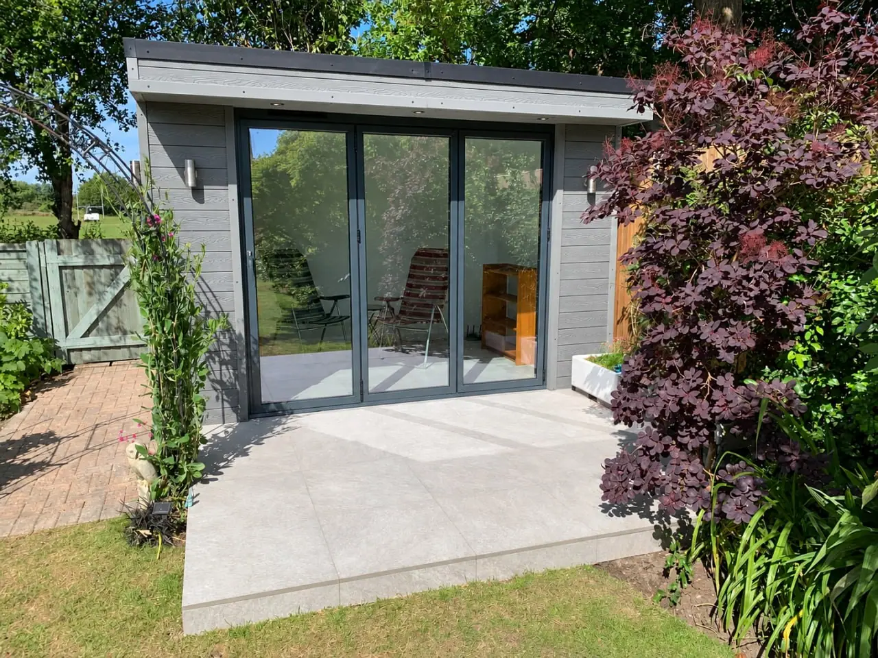 Glazed Garden Building among Planting