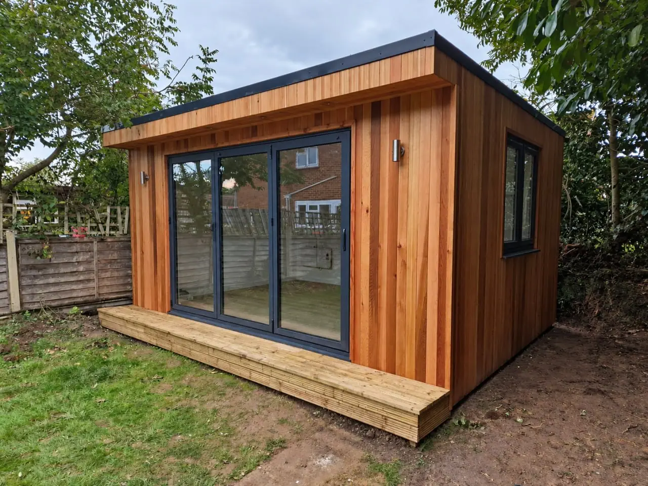 Timber Garden Room beside Paving